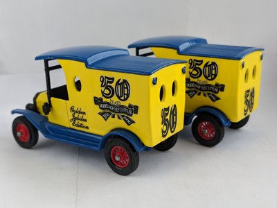 Blue and yellow, with matching wheels and rear doors.