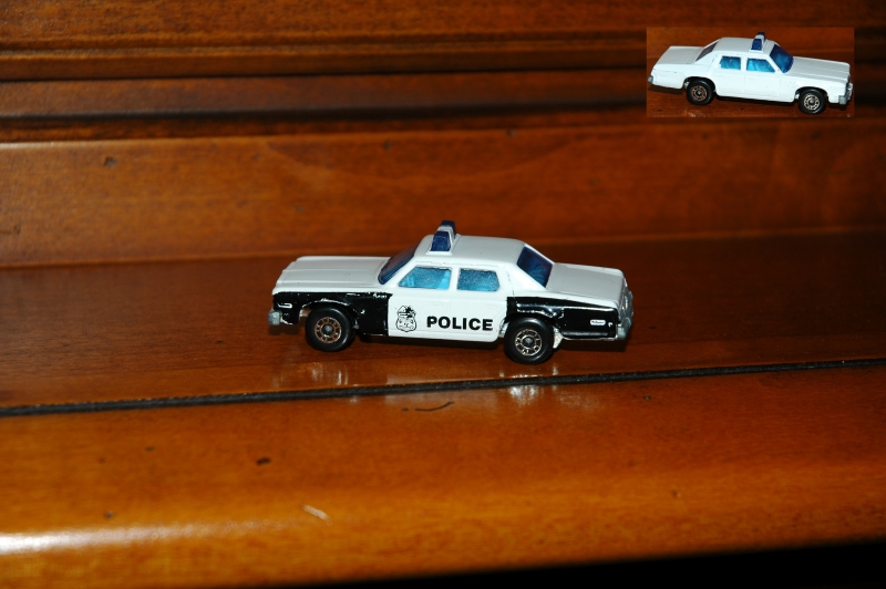 10C_Plymouth Gran Fury Police Car_Police_blue windows and lights_right side without imprint_dd wheels_unpainted base Lesney_G_no Box.jpg